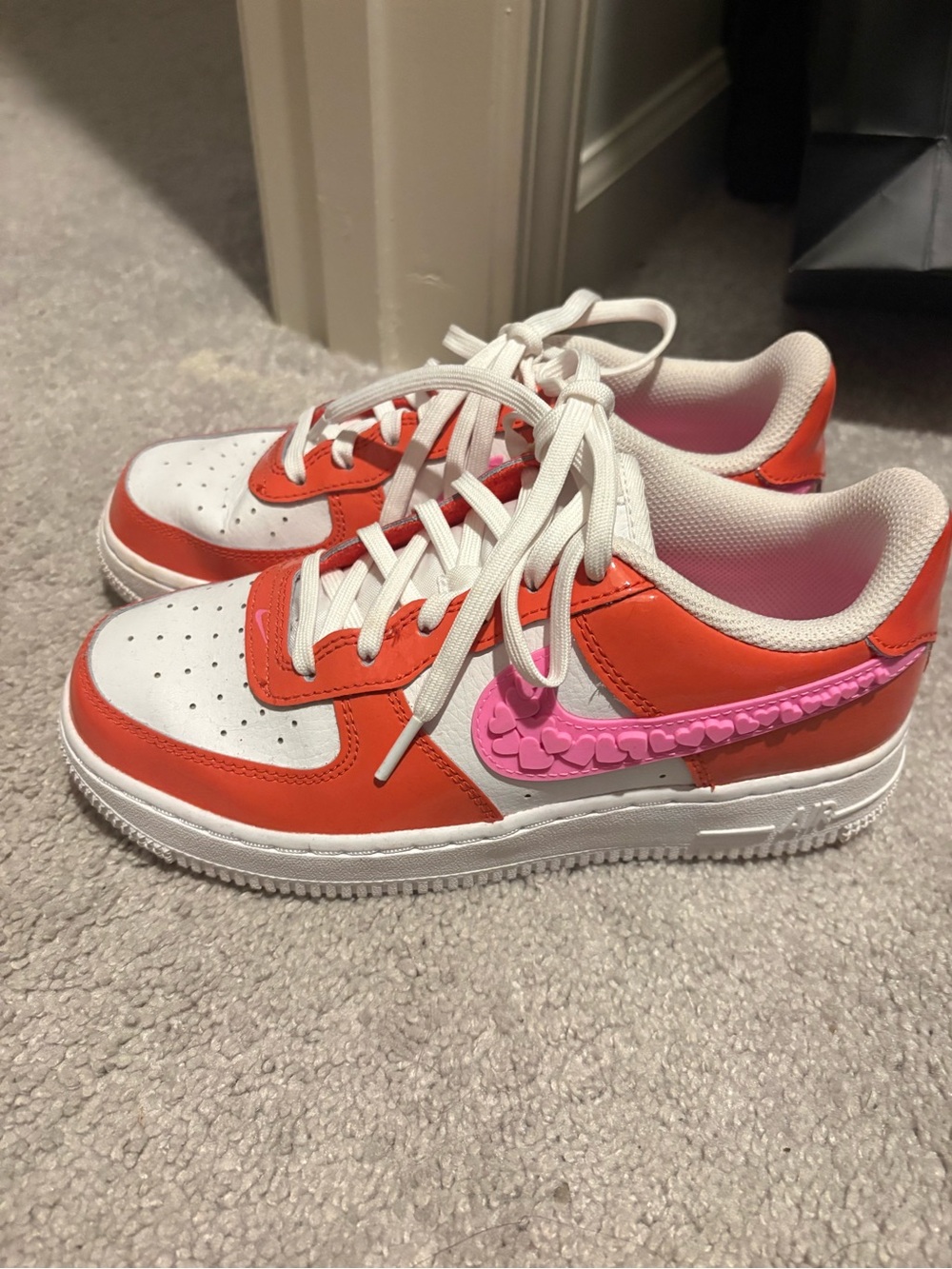 Nike Kids Low-Top Sneakers in White, Orange, and Pink